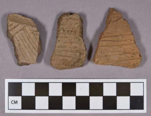 Ceramic, earthenware rim and body sherds, incised, chevron, and dentate, includes grit-tempered