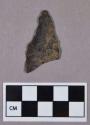 Chipped stone, projectile point, stemmed, assymetrical