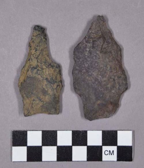 Chipped stone, one ovate projectile point with basal flaking, one stemmed projectile point, and one drill