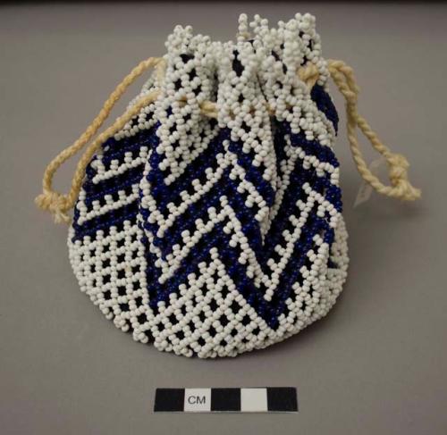 Beaded bag, dark blue and white