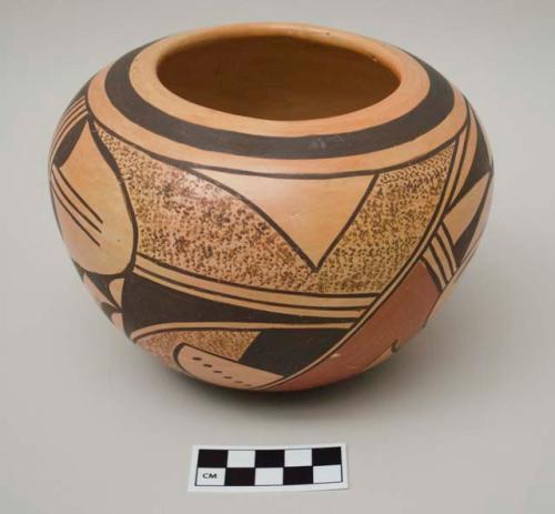 Globular pot with black and orange design