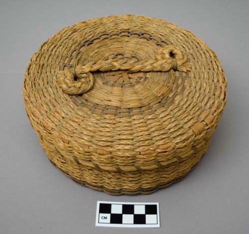 Round, covered sewing basket