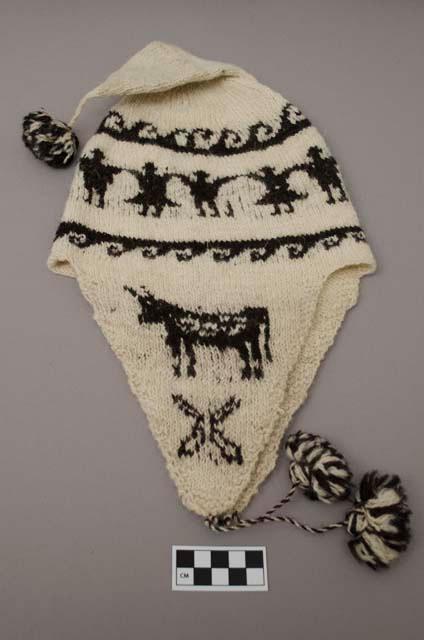 Knitted farmer's hat with earflaps