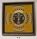 Small square sand painting, framed, signed Magg 6-77- with a cloud? symbol
