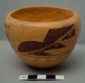 Small pot with feather design, signed Hopi