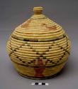Bundle-coiled basket with knobbed lid
