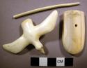 Ivory carving of a raven flying, 3 pieces: bird, stick, and base