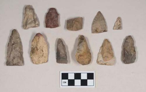 Chipped stone, projectile points, triangular and ovate, and projectile point fragments