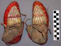 One pair of children's moccasins--decorated on top and bottom with beadwork