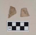 Chipped stone, projectile point fragment, triangular; chipped stone, projectile point fragment