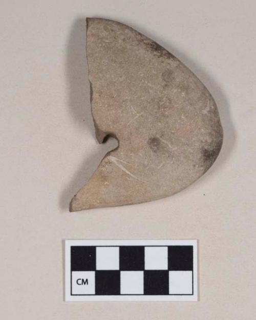 Ground stone fragment, perforated, possible gorget