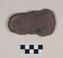 Chipped stone tool, cortex on one side. Bifacially worked and shaped.