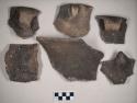 Ceramic, earthenware rim sherds,some cord impressed, some undecorated some with handles, some with lugs, shell temper