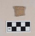 Ceramic, earthenware rim sherd, flared rim, undecorated, shell-tempered