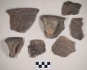 Ceramic, earthenware body, rim, and handle sherds, incised, shell-tempered; some with possible Ramie design, one with molded handle
