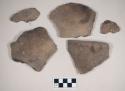 Ceramic, earthenware body and rim sherds, rim with lug, undecorated, shell-tempered; three sherds crossmend