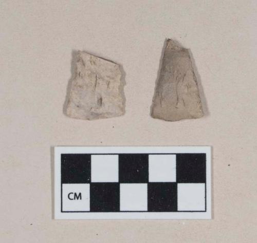 Chipped stone, projectile point fragment, triangular; chipped stone, projectile point fragment