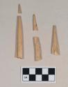 Worked animal bone awl fragments; two fragments and two fragments crossmend