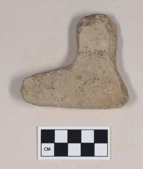 Stone fragment, no visible modification, L-shaped