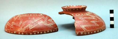 Broken pedestal pottery vessel - red with white designs, black inside