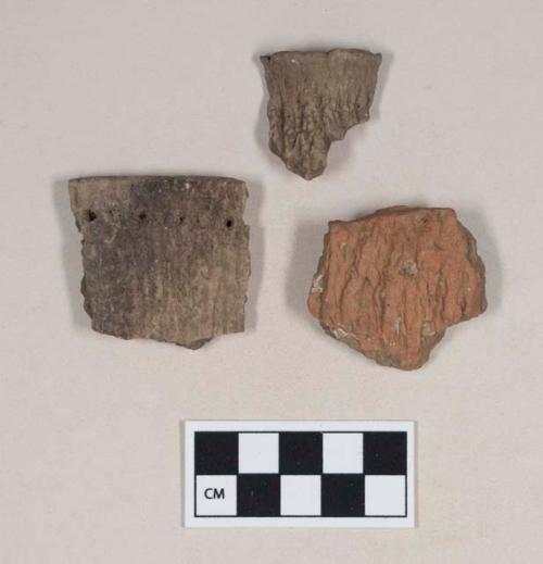 Ceramic, earthenware body and rim sherds, grit-tempered, two cord-impressed, one cord-impressed and punctate