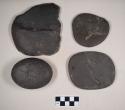 Worked cannel coal, flat disks, and one worked fragment