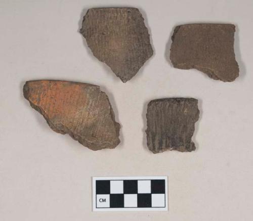 Ceramic, earthenware rim sherds, cord-impressed, some shell-tempered, some grit-tempered