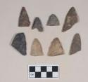 Chipped stone, biface fragments; chipped stone, projectile point with bifurcate base, likely reworked