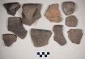 Ceramic, earthenware body, rim, and handle sherds, incised, one incised and punctate, shell-tempered; possible Ramie design; two sherds crossmend