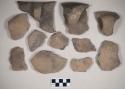 Ceramic, earthenware body, rim, and handle sherds, undecorated and cord-impressed, shell-tempered
