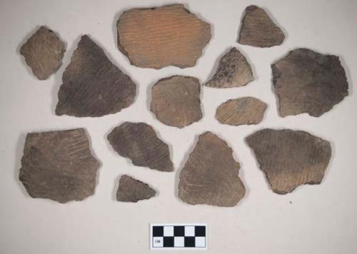 Ceramic, earthenware body and rim sherds, cord-impressed, one undecorated, grit-tempered