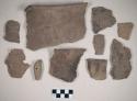 Ceramic, earthenware rim, body, and handle sherds, undecorated, shell-tempered, some with perforations, some sherds crossmend; molded earthenware object, one hole