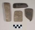Ground stone, adze fragment; ground stone, fragment, possible adze; ground stone, rectangular fragment; ground stone, flat rectangular object