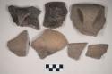 Ceramic, earthenware body, rim, and handle sherds, cord-impressed, one cord-impressed and incised, shelll-tempered