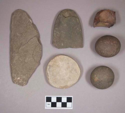 Chipped stone, core; ground stone, flat ovoid fragment, fragments of possibly natural stone, cobbles, no visible modification