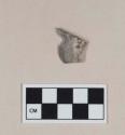 Chipped stone, biface fragment, notched