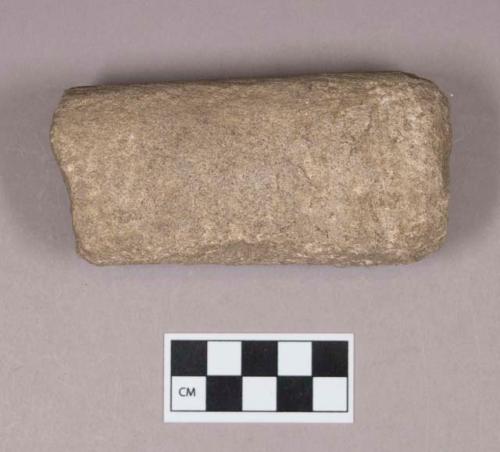 Ground stone, pecked and ground cylinder, pecked indentation at one end