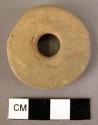 Pottery spindle whorl made of burnished sherd