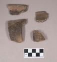 Ceramic, earthenware rim and handle sherds, undecorated, shell-tempered; three sherds crossmend