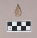 Chipped stone, projectile point, side-notched, with cortex