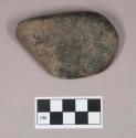 Ground stone, ground and polished stone, pecked at one end, scratched or incised, possible pounding stone