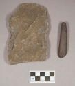 Ground stone, notched stone fragment, possible axe; ground stone, possibly incised object