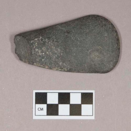 Ground stone, pecked and ground stone edged tool fragment