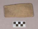 Ground stone, flat rectangular object