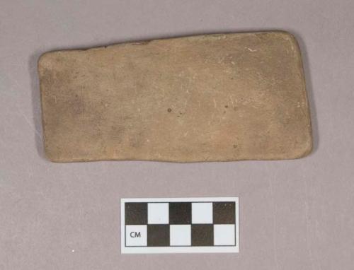 Ground stone, flat rectangular object