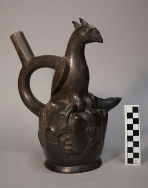 Stirrup pot; black; with bird