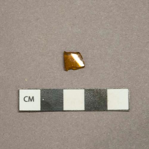 Light amber glass vessel fragment