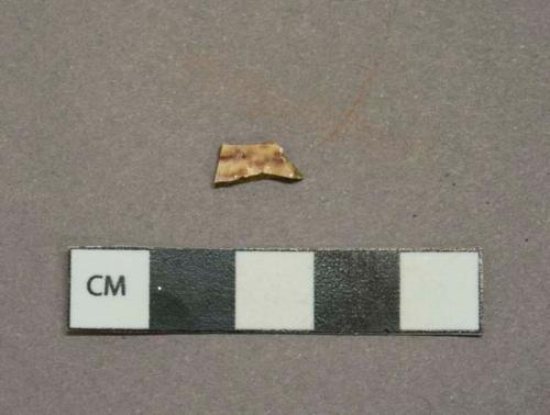 Brown on cream mottled lead glazed earthenware vessel body fragment, buff paste, likely rockingham type or clouded ware