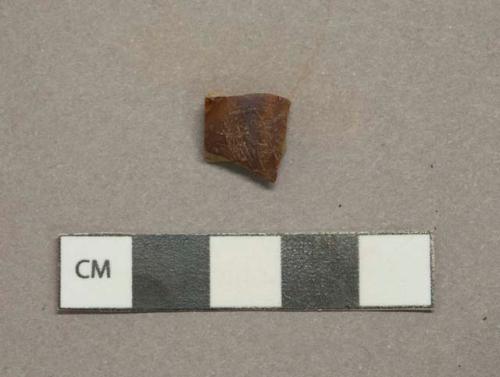 Mottled brown lead glazed earthenware vessel body fragment, buff paste, likely Rockingham type