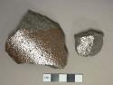 Brown salt glazed stoneware fragments, gray paste, likely sewer pipe